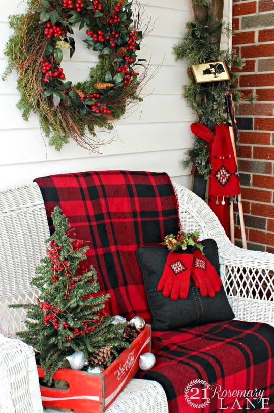 Christmas porch white wicker love seat